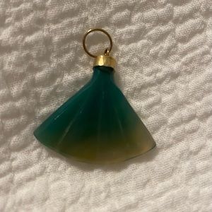 Green jade like  color pendant.